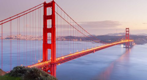 San Francisco golden gate bridge at dusk with lights on