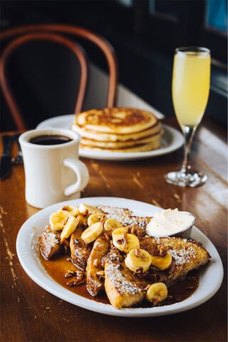 Eagle Cafe’s Banana Pecan French Toast sprinkled with powdered sugar