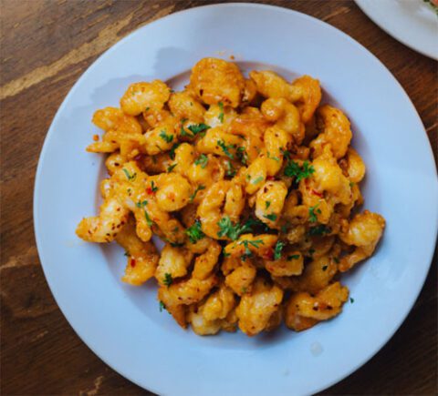 Eagle Cafe’s Crispy Spicy Shrimp on a white plate