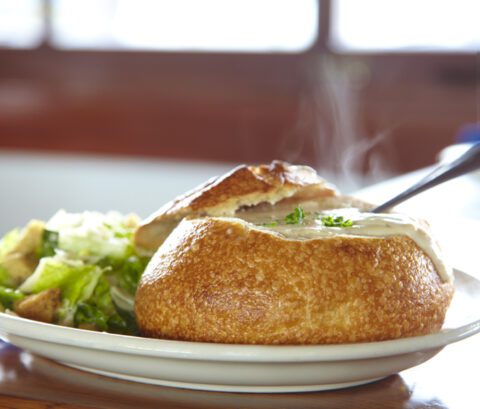 clam chowder in a sourdough bread bowl