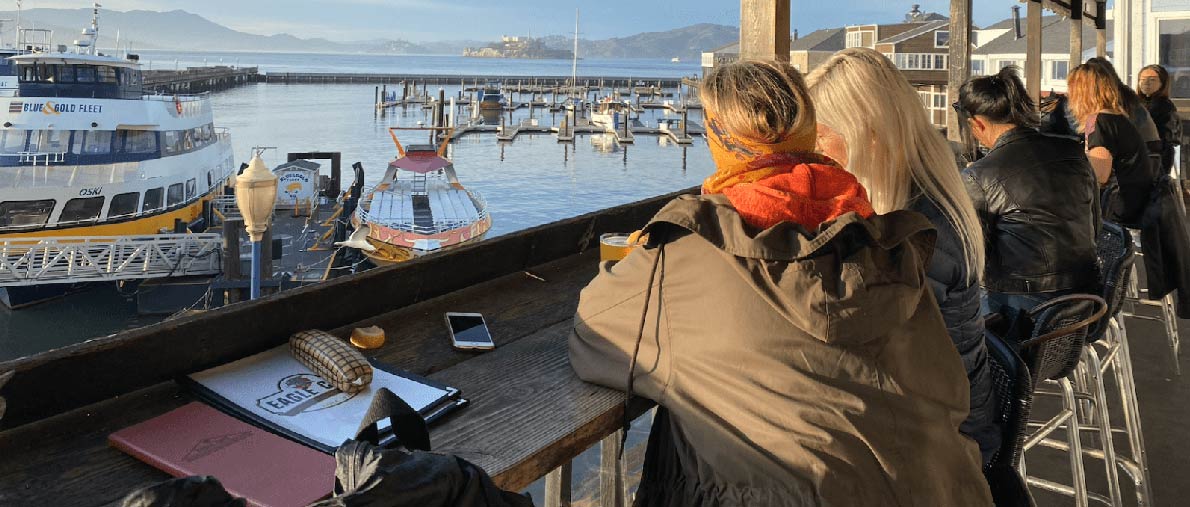 Diners enjoying the view from Eagle Cafe’s patio