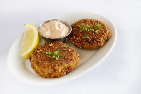 Crab cakes served with remoulade