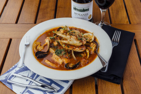 Ciopinno served with red wine